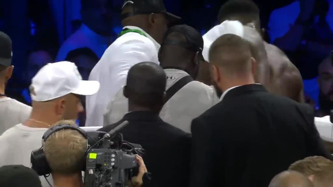 ⁣Anthony Joshua confronts Oleksandr Usyk after defeat & throws belts out of the ring