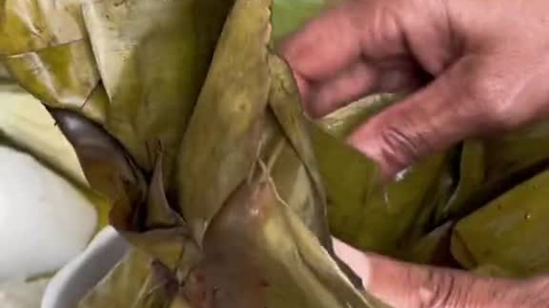 ⁣Goats Meat steamed in banana leaves.